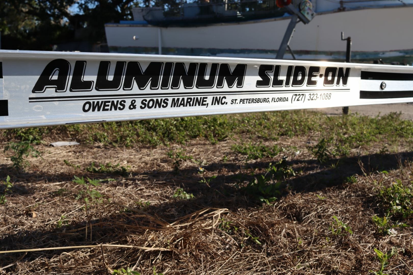 owens and sons aluminum slide on trailer logo